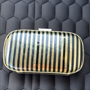 Anya Hindmarch Gold and Black Striped Clutch